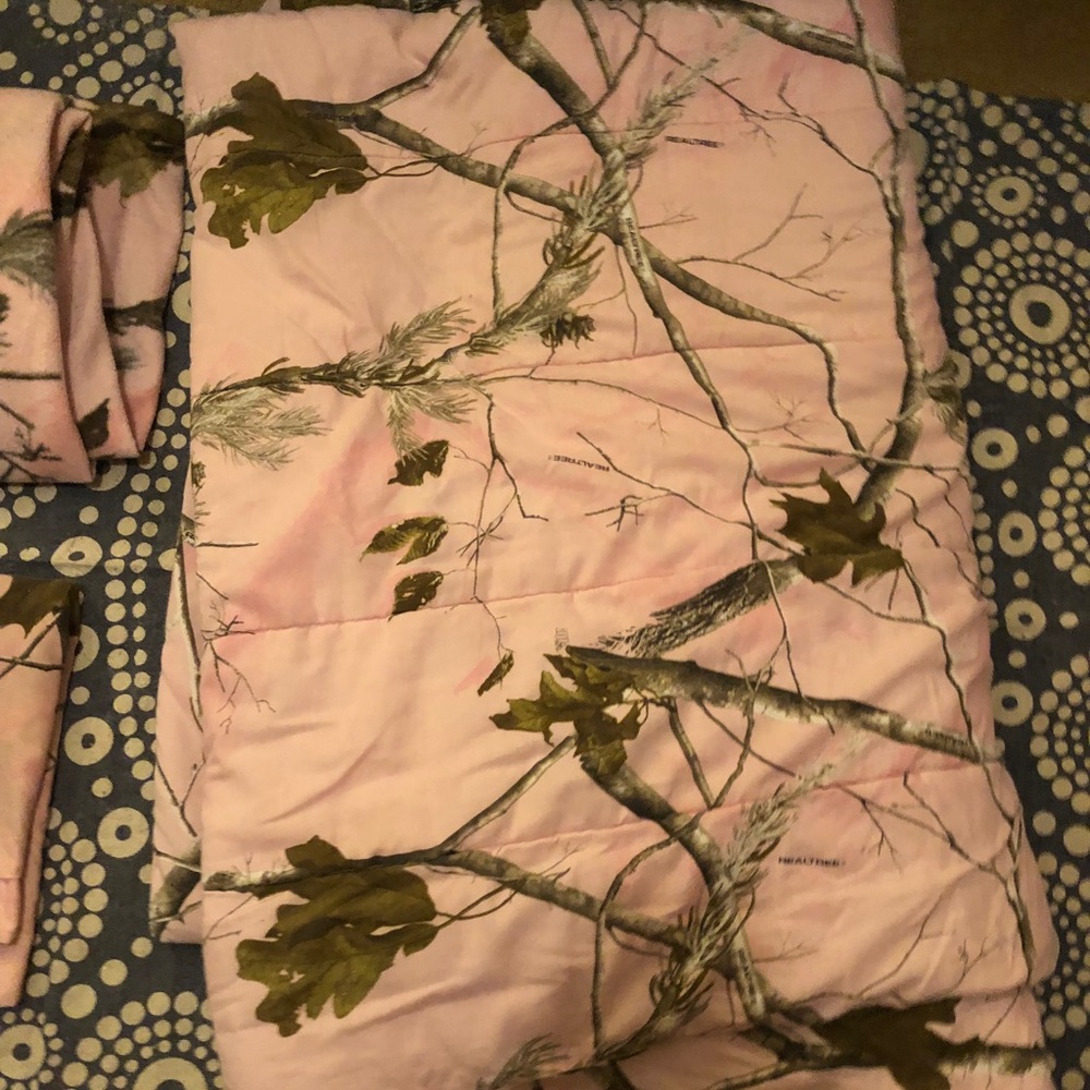 Pink camouflage bed sheets and curtains